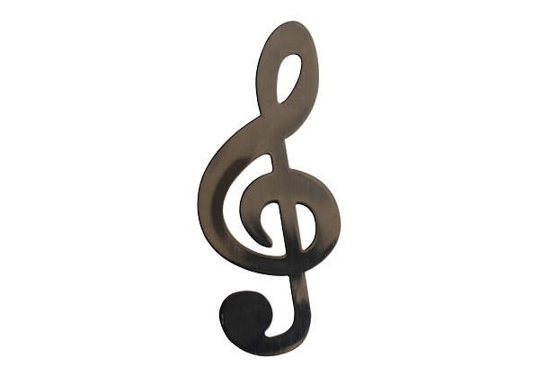 Treble clef, stainless steel isolated on white background.